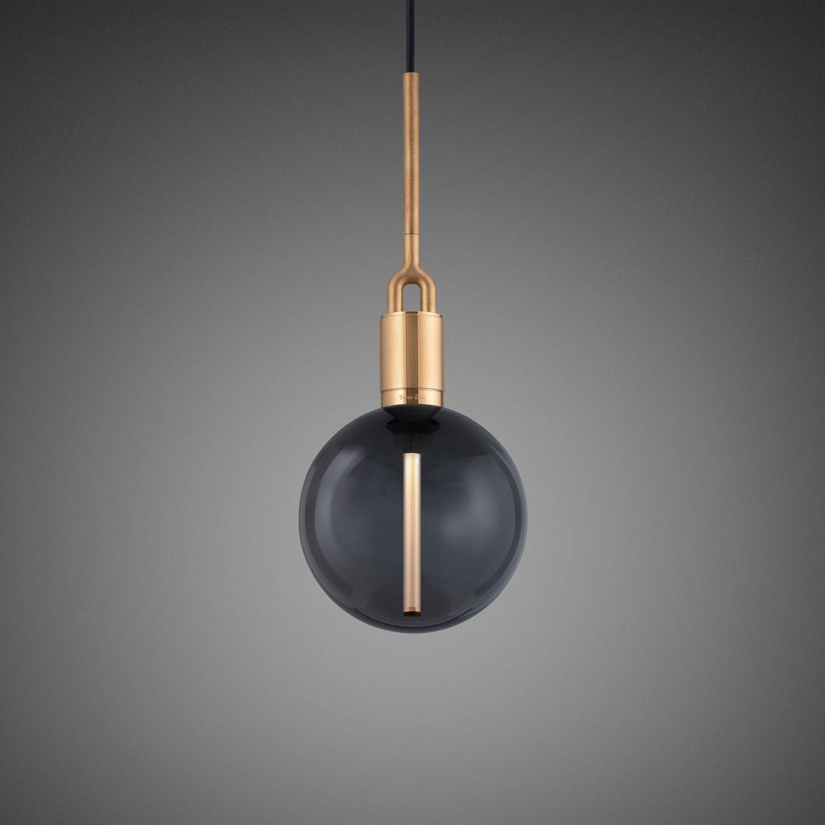 Forked Single Pendant in a Brass Finish with Medium Smoked Globe