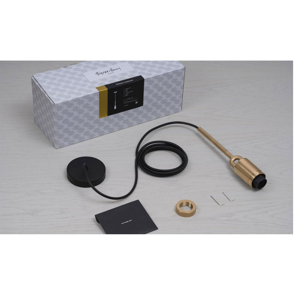 Forked Single Pendant in a Brass Finish with Medium Smoked Globe