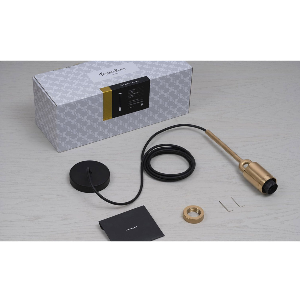 Forked Single Shade Pendant in a Brass Finish with Medium Smoked Globe