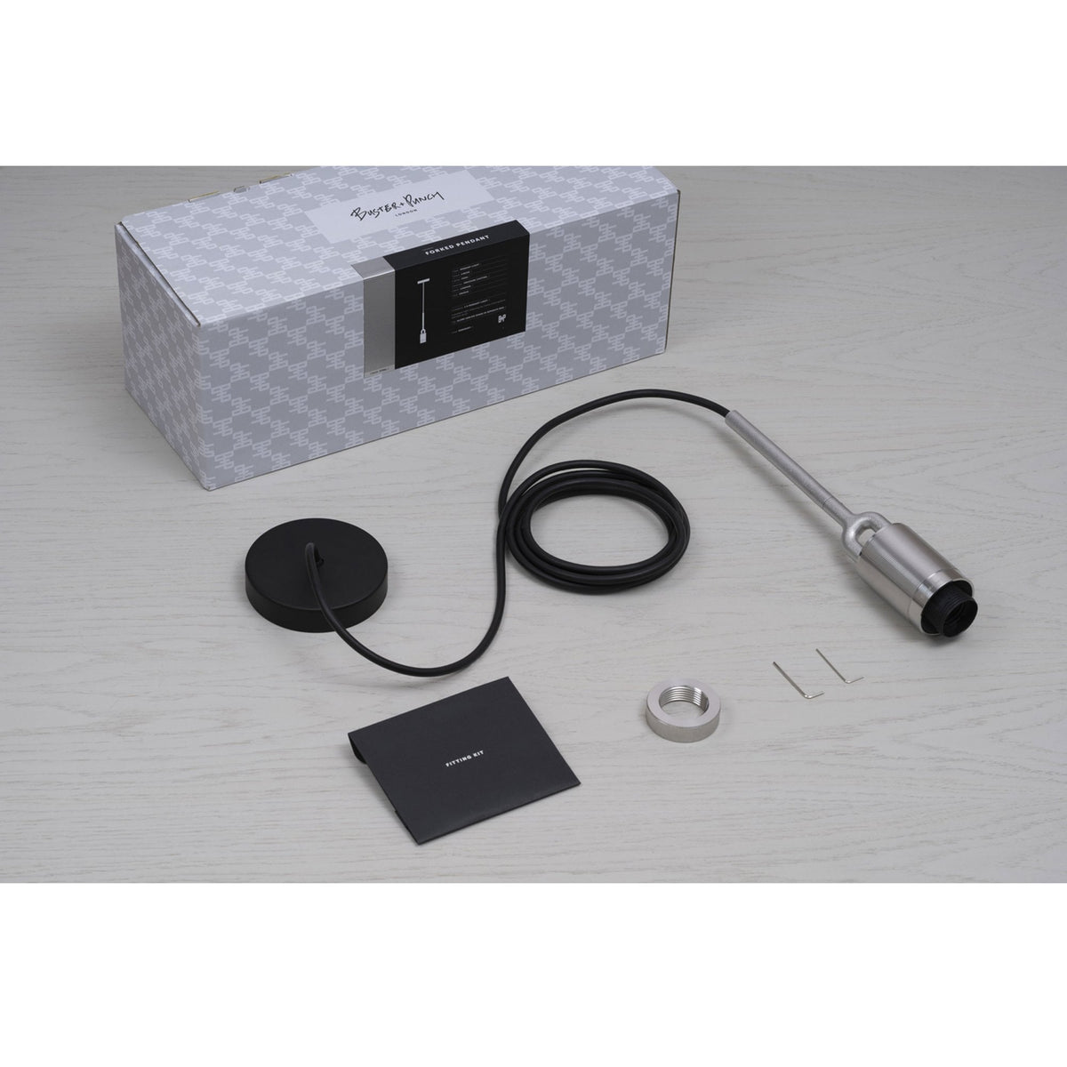 Forked Single Shade Pendant in a Burnt Steel Finish with Medium Smoked Globe