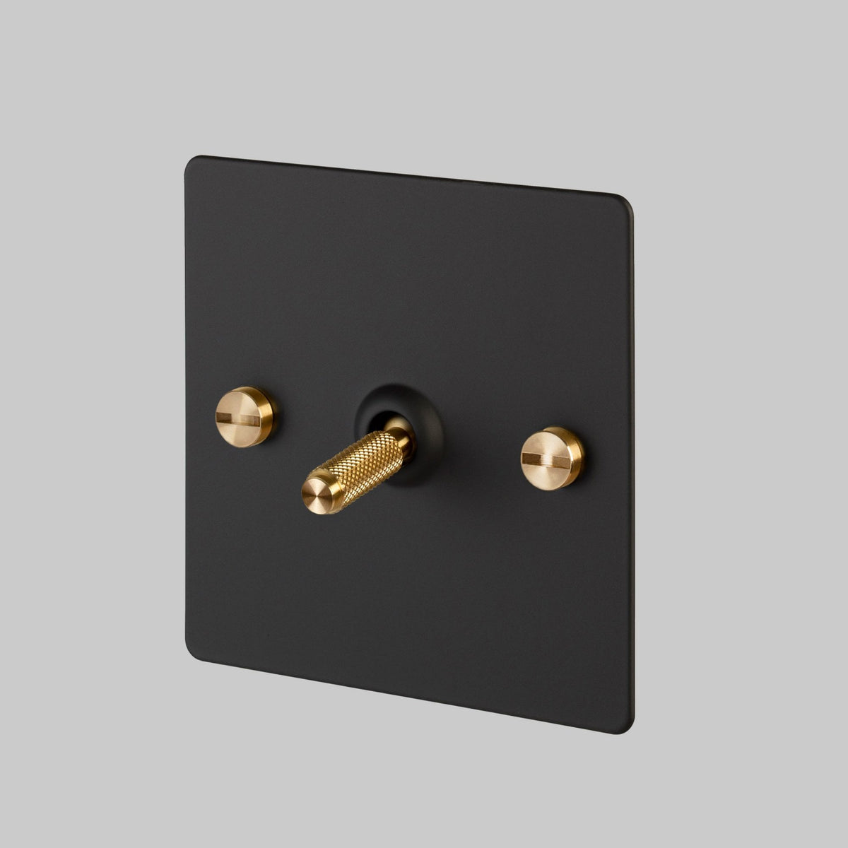One Gang 2-Way Light Switch in Black & Brass with Knurled Toggle