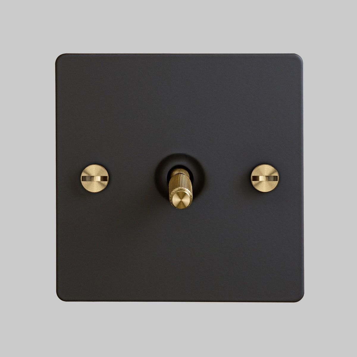 One Gang 2-Way Light Switch in Black & Brass with Knurled Toggle