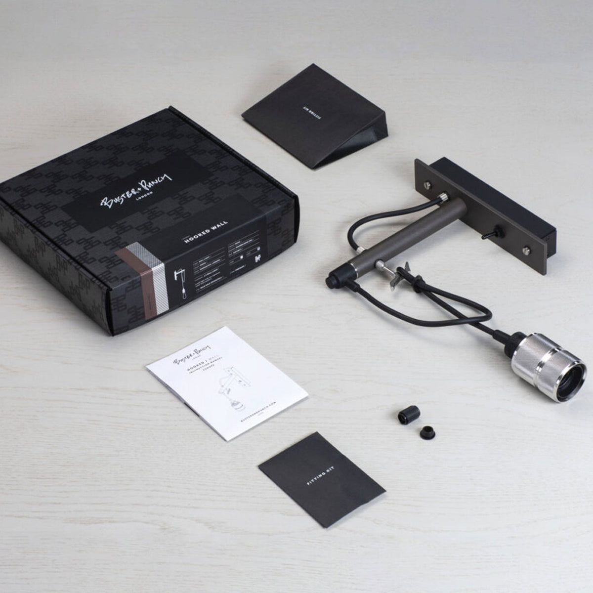 Hooked Nude Switched Wall Light in Graphite and Steel Finish