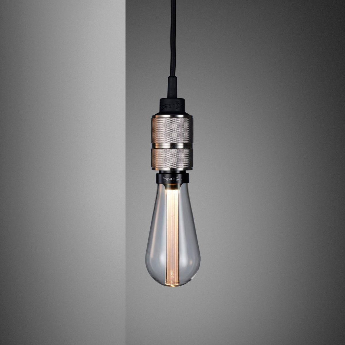 Hooked Nude Switched Wall Light in Graphite and Steel Finish