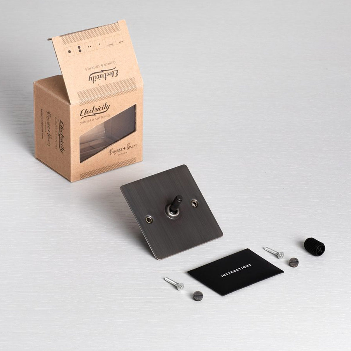 One Gang 2-Way Light Switch in Smoked Bronze & Steel with Knurled Toggle