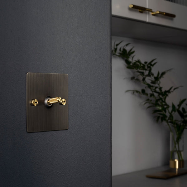 One Gang 2-Way Light Switch in Smoked Bronze & Brass with Knurled Toggle