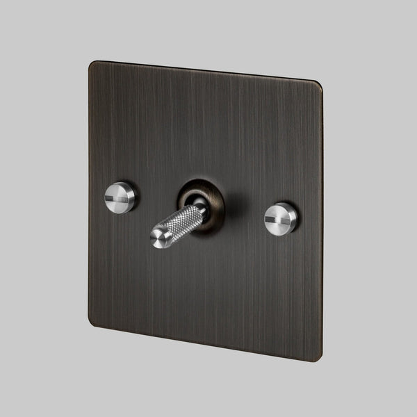 One Gang 2-Way Light Switch in Smoked Bronze & Steel with Knurled Toggle