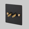 Two Gang 2-Way Light Switch in Black & Brass with Knurled Toggles