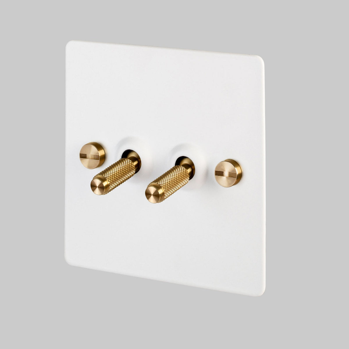 Two Gang 2-Way Light Switch in White & Brass with Knurled Toggles