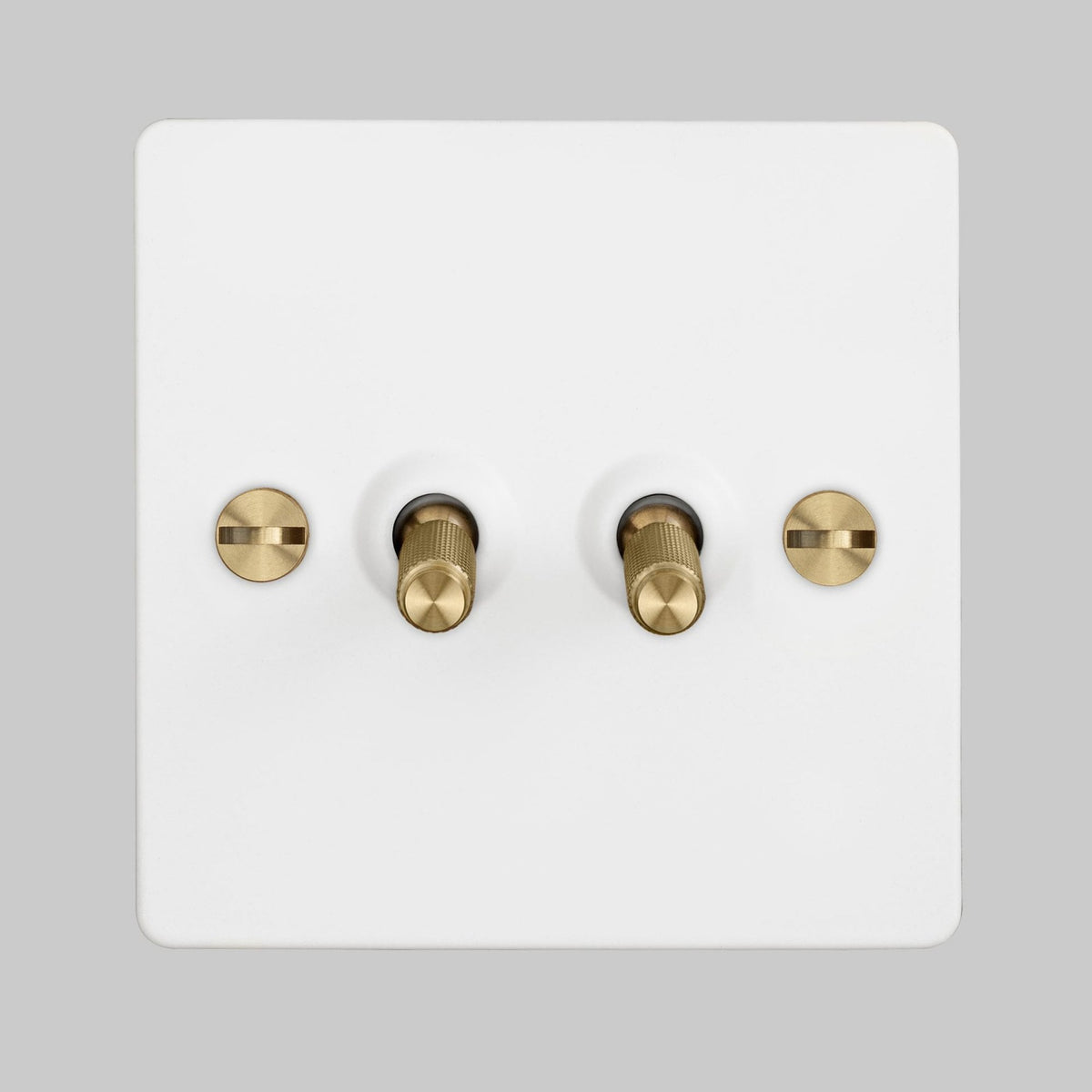 Two Gang 2-Way Light Switch in White & Brass with Knurled Toggles