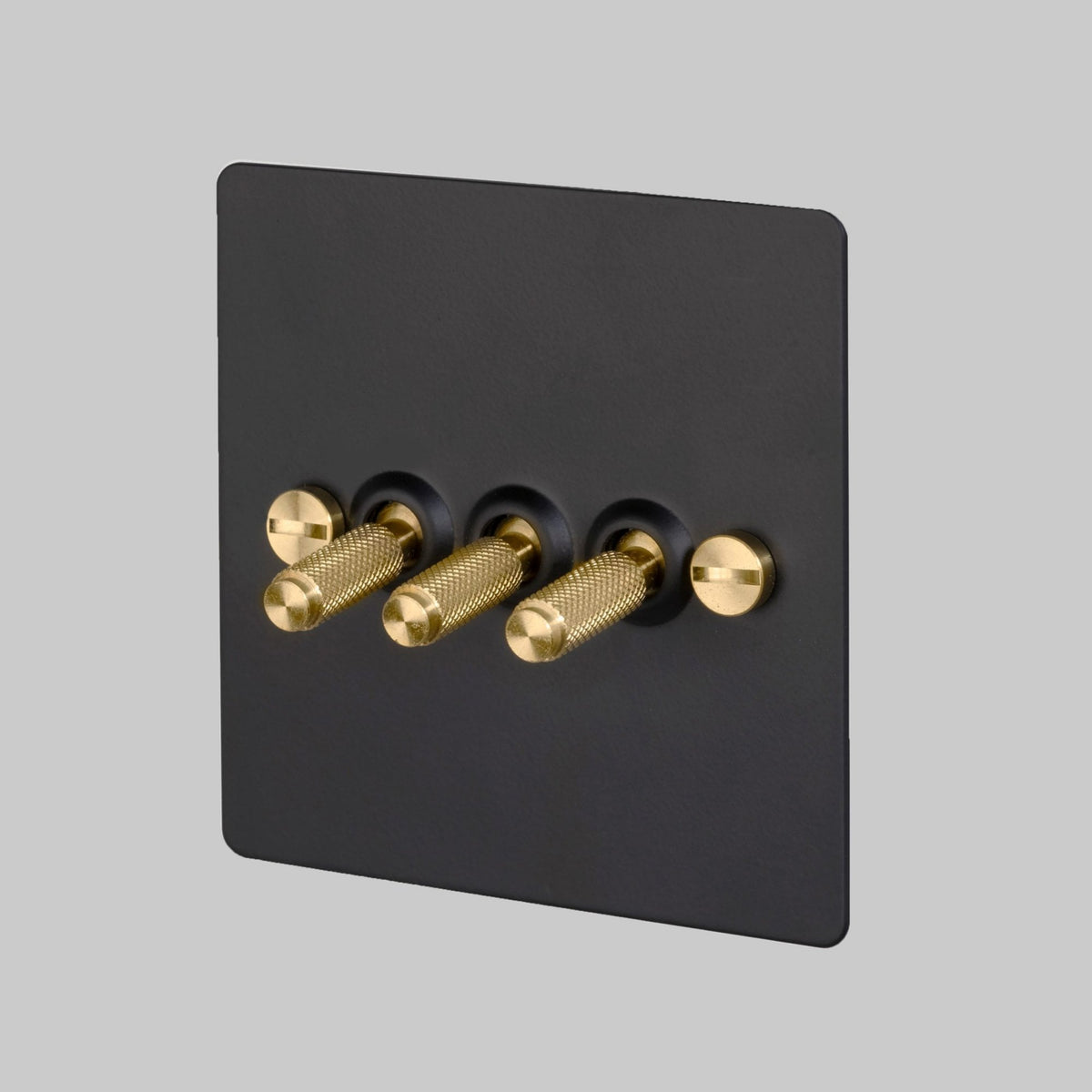 Three Gang 2-Way Light Switch in Black & Brass with Knurled Toggles