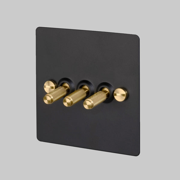 Three Gang 2-Way Light Switch in Black & Brass with Knurled Toggles