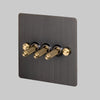 Three Gang 2-Way Light Switch in Smoked Bronze & Brass with Knurled Toggles