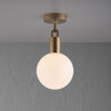 Forked Ceiling Light in a Brass Finish with Medium Opal Globe