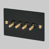 Four Gang 2-Way Light Switch in Black & Brass with Knurled Toggles
