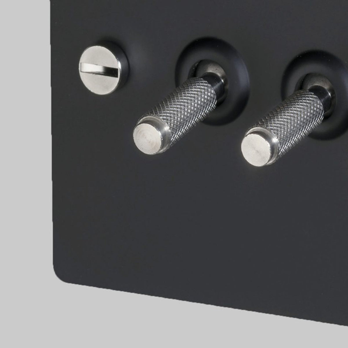 Four Gang 2-Way Light Switch in Black & Steel with Knurled Toggles