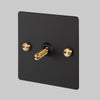 One Gang 3-Way Intermediate Light Switch in Black & Brass with Knurled Toggle
