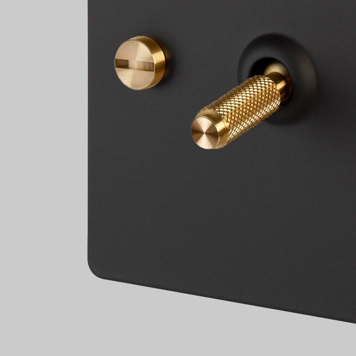 One Gang 3-Way Intermediate Light Switch in Black & Brass with Knurled Toggle