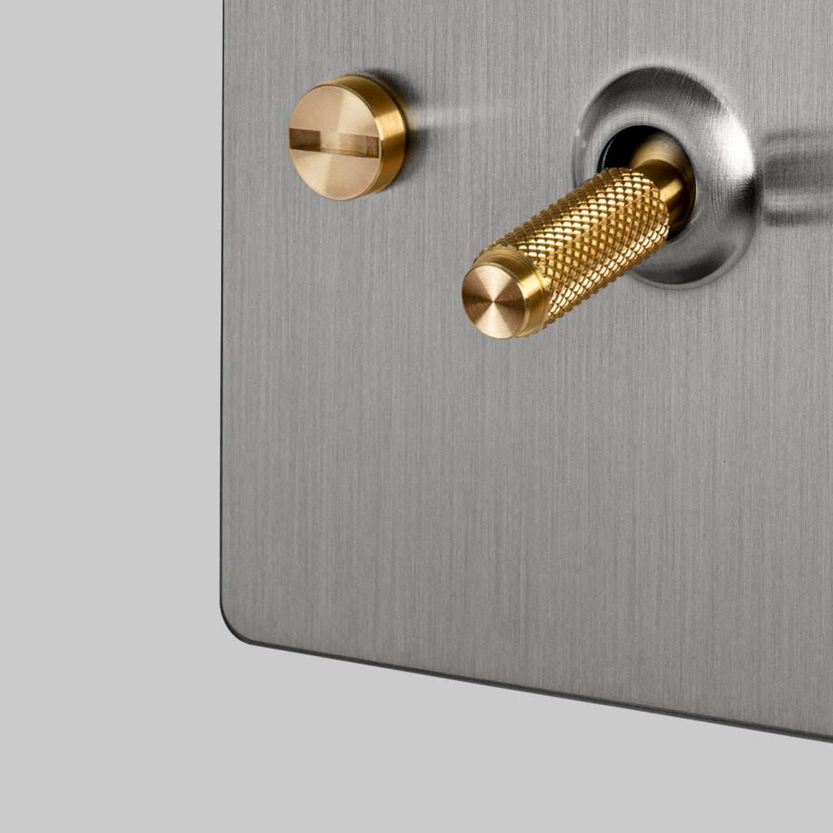 One Gang 3-Way Intermediate Light Switch in Steel & Brass with Knurled Toggle