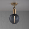 Forked Ceiling Light in a Brass Finish with Medium Smoked Globe