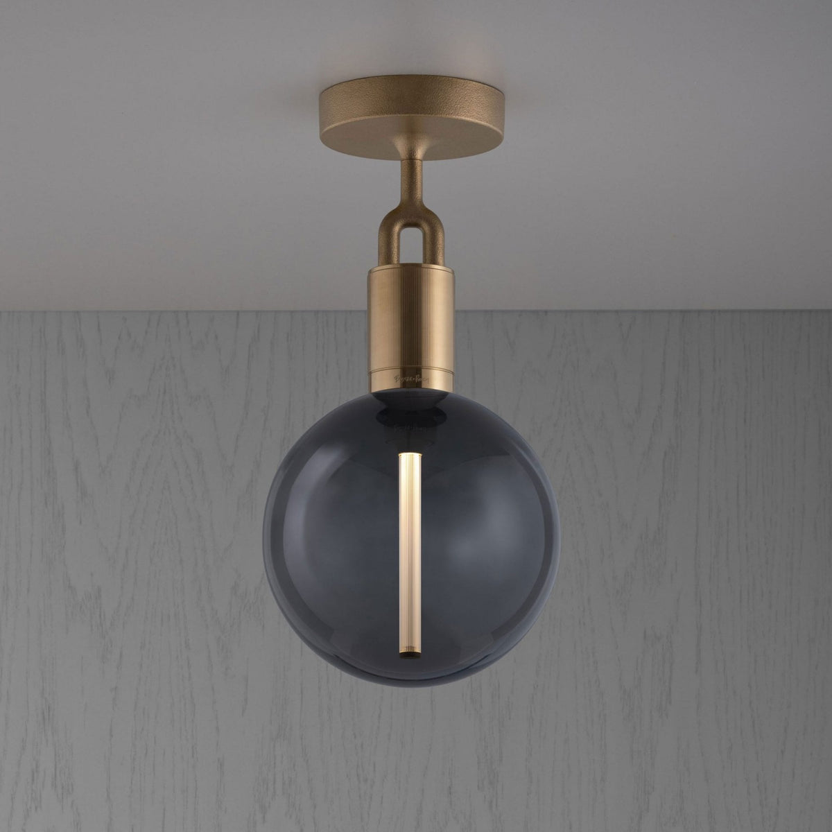 Forked Ceiling Light in a Brass Finish with Medium Smoked Globe