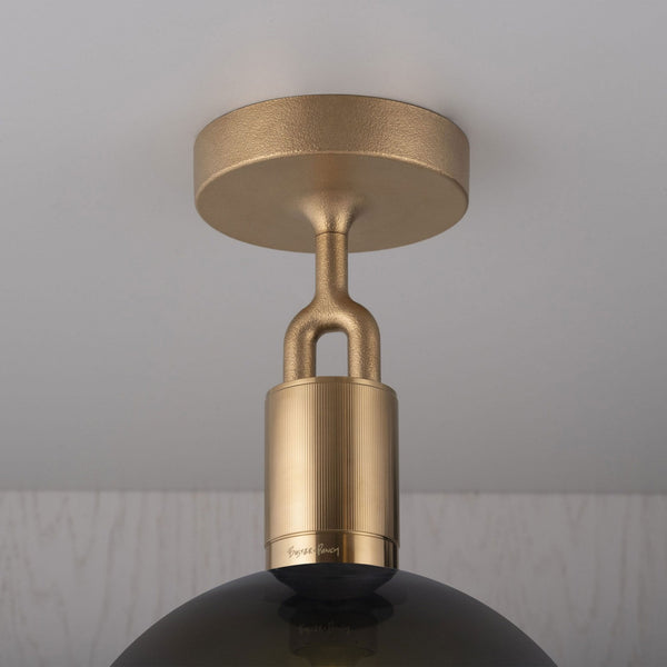 Forked Ceiling Light in a Brass Finish with Medium Smoked Globe
