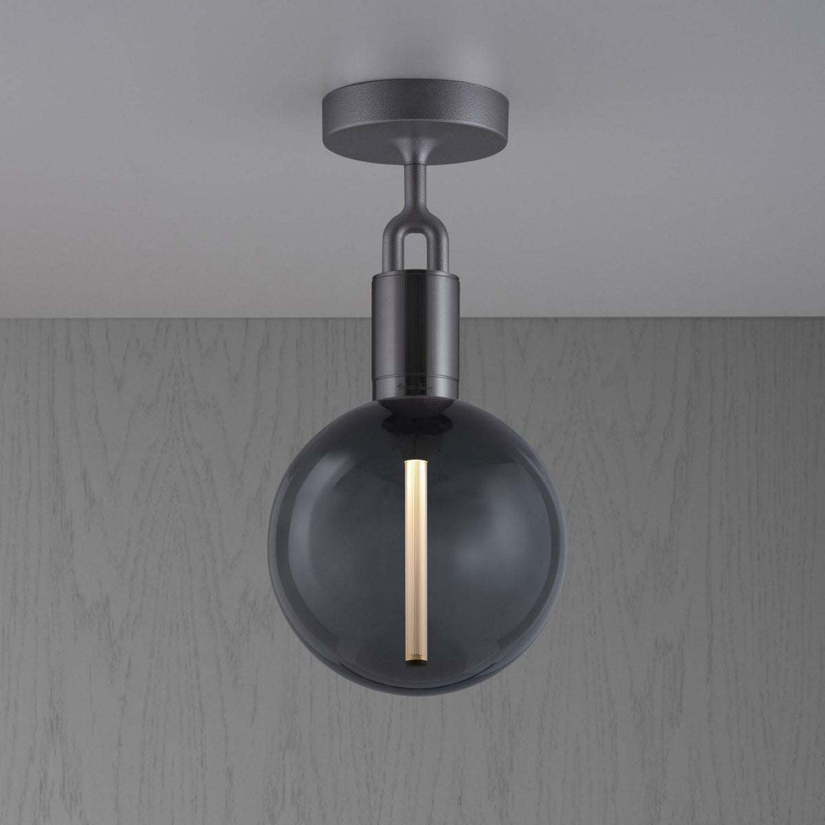 Forked Ceiling Light in a Gun Metal Finish with Medium Smoked Globe