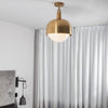 Forked Shade Ceiling Light in a Brass Finish with Large Opal Globe