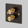 Two Gang 2-Way Dimmer Light Switch in Smoked Bronze & Brass with Knurled Knobs
