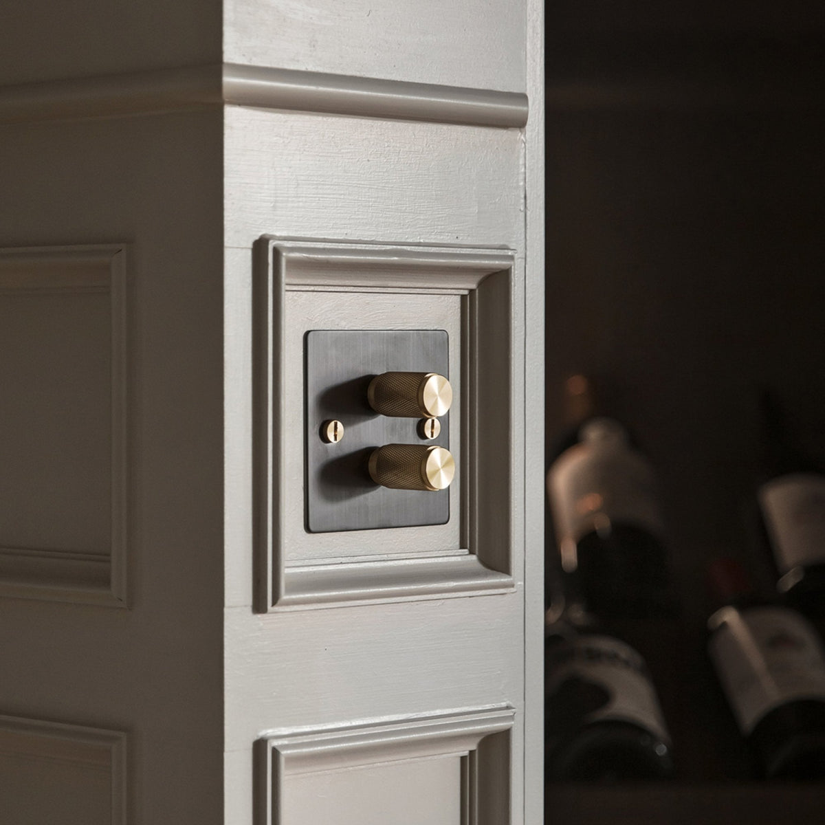 Two Gang 2-Way Dimmer Light Switch in Smoked Bronze & Brass with Knurled Knobs