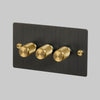 Three Gang 2-Way Dimmer Light Switch in Smoked Bronze & Brass with Knurled Knobs