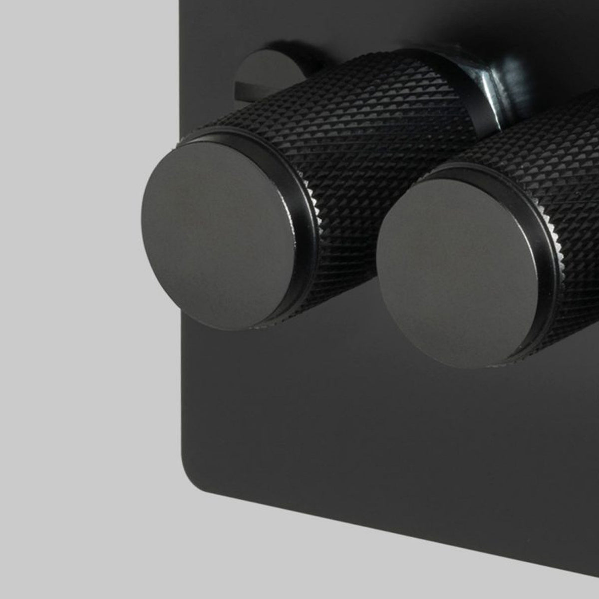 Four Gang 2-Way Dimmer Light Switch in Black with Knurled Knobs