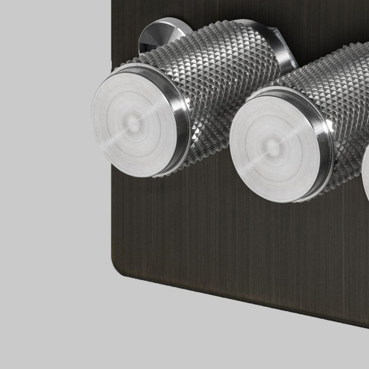 Four Gang 2-Way Dimmer Light Switch in Smoked Bronze & Steel with Knurled Knobs