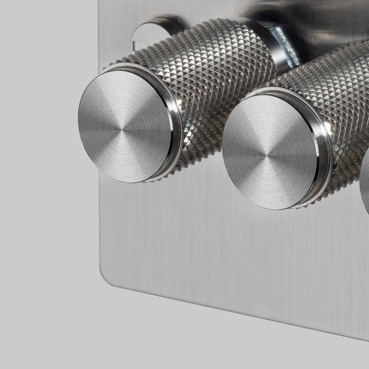 Four Gang 2-Way Dimmer Light Switch in Steel with Knurled Knobs