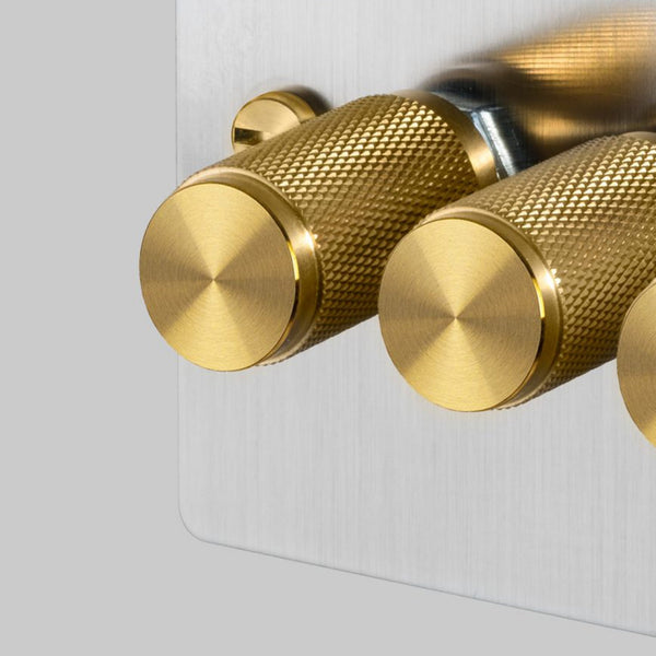 Four Gang 2-Way Dimmer Light Switch in Steel & Brass with Knurled Knobs