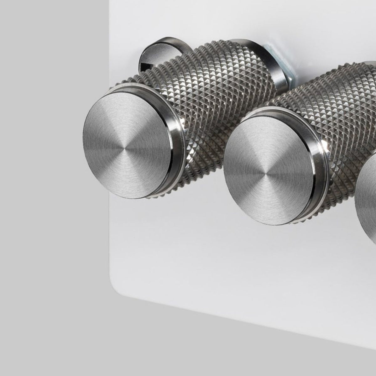 Four Gang 2-Way Dimmer Light Switch in White & Steel with Knurled Knobs