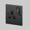One Gang 13 Amp Switched Plug Socket In Black