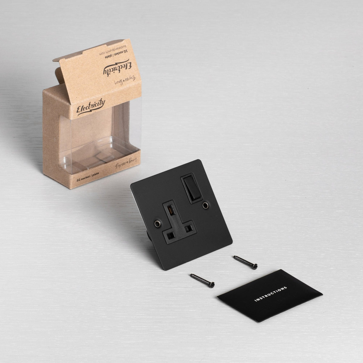 One Gang 13 Amp Switched Plug Socket In Black