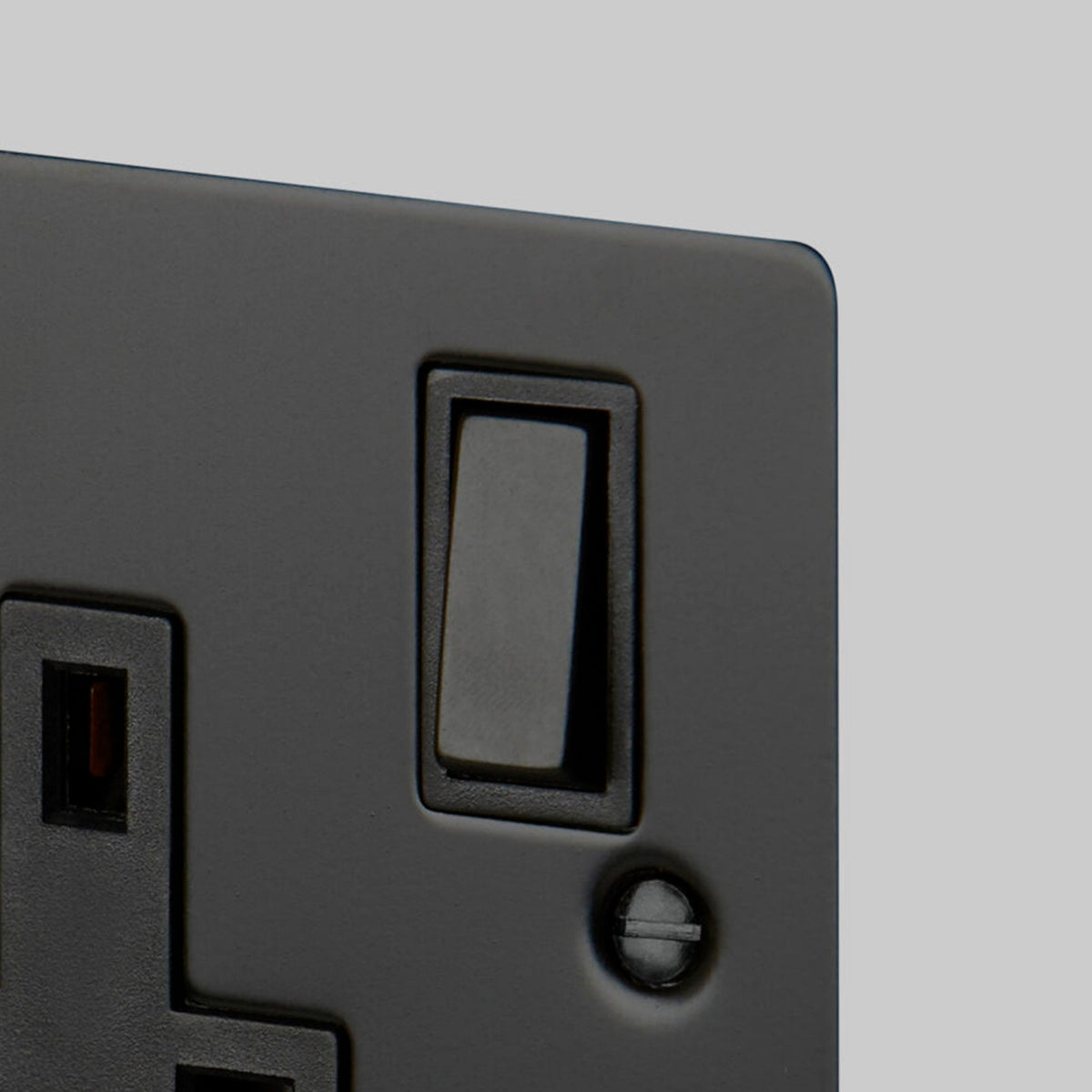 One Gang 13 Amp Switched Plug Socket In Black