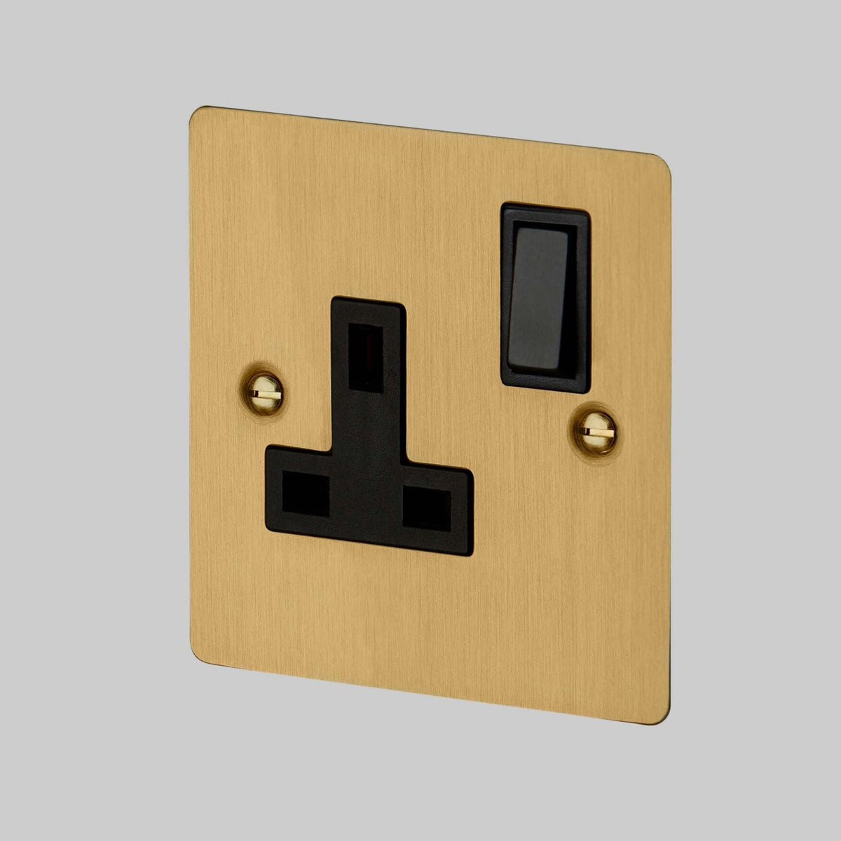 One Gang 13 Amp Switched Plug Socket In Solid Brass