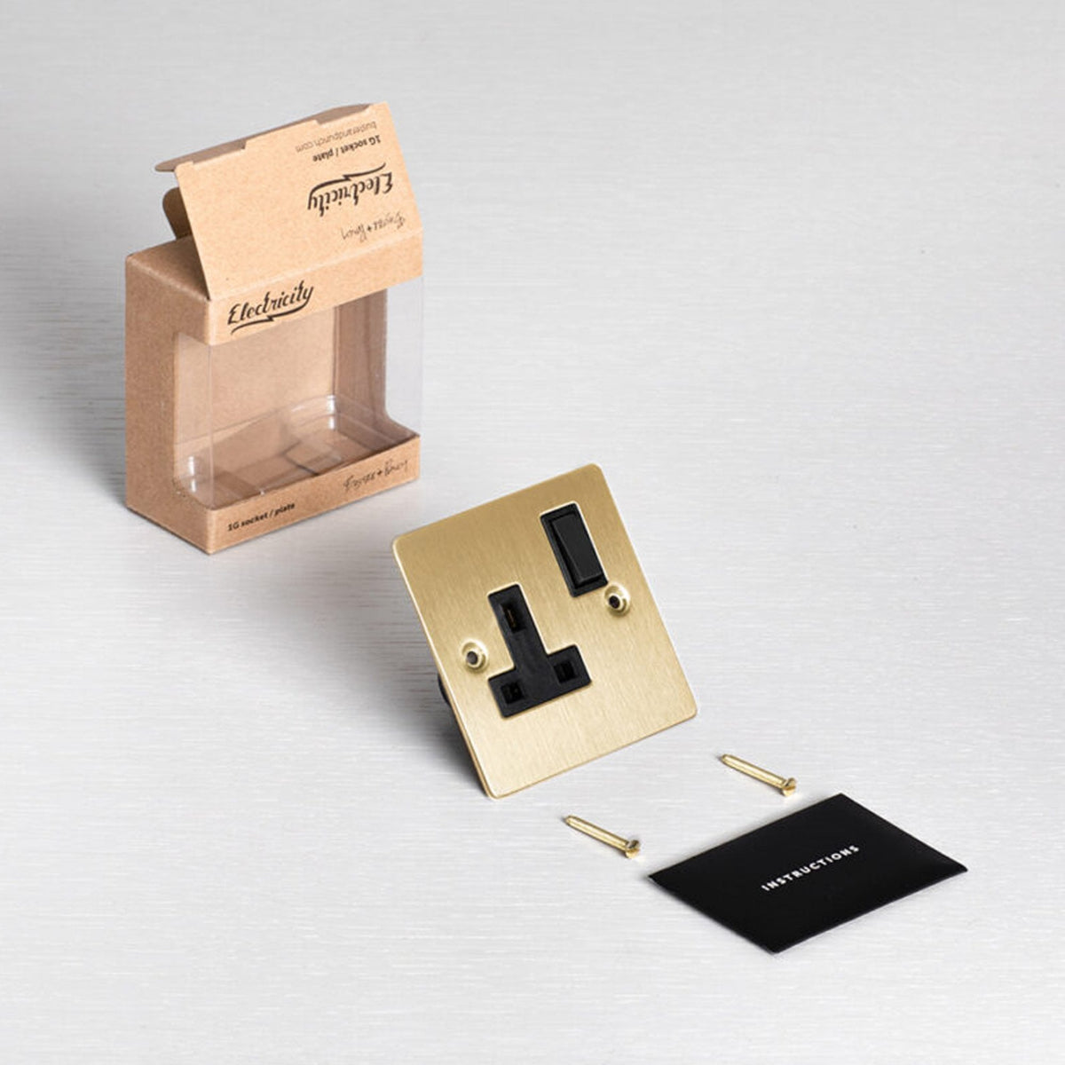 One Gang 13 Amp Switched Plug Socket In Solid Brass