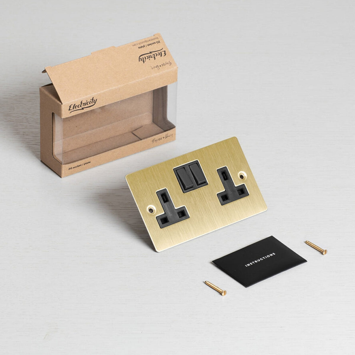 Two Gang 13 Amp Switched Plug Socket In Solid Brass