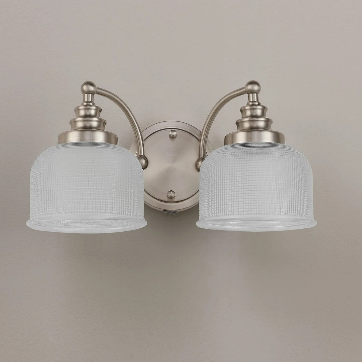Stowford Switched Twin Wall Light in Satin Nickel & Clear Prismatic Glass