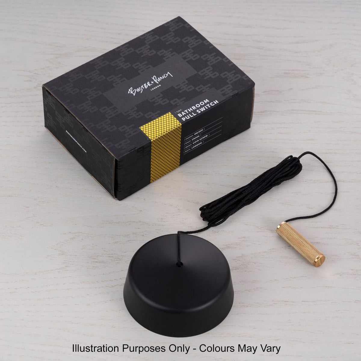 Black bathroom pull switch with a gold pull cord, next to its black and gold packaging.