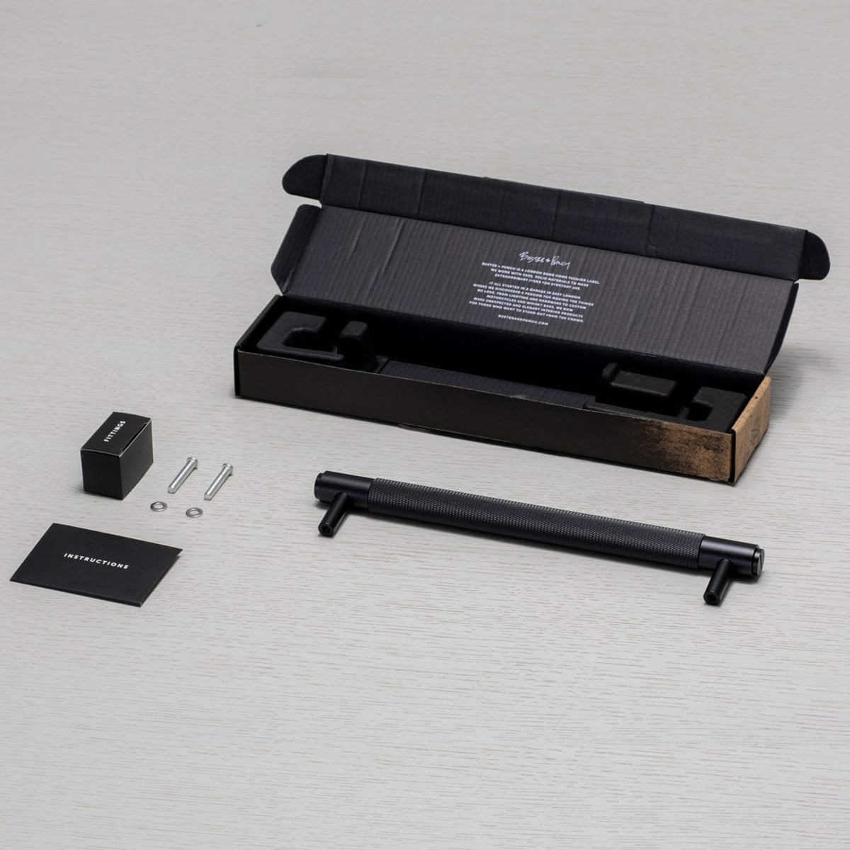 Knurled Medium Pull Bar Cabinet Handle In Black