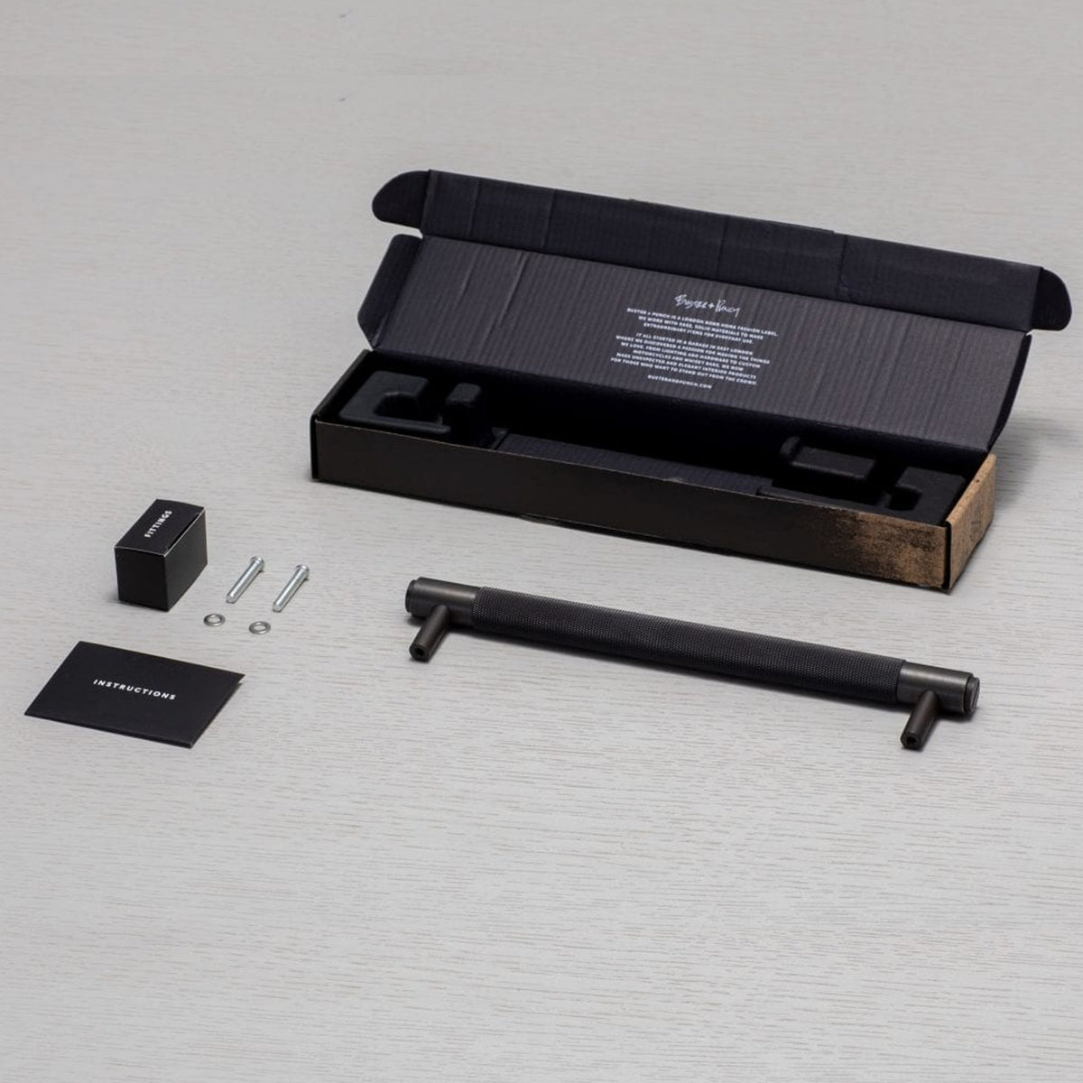 Knurled Medium Pull Bar Cabinet Handle In Solid Smoked Bronze