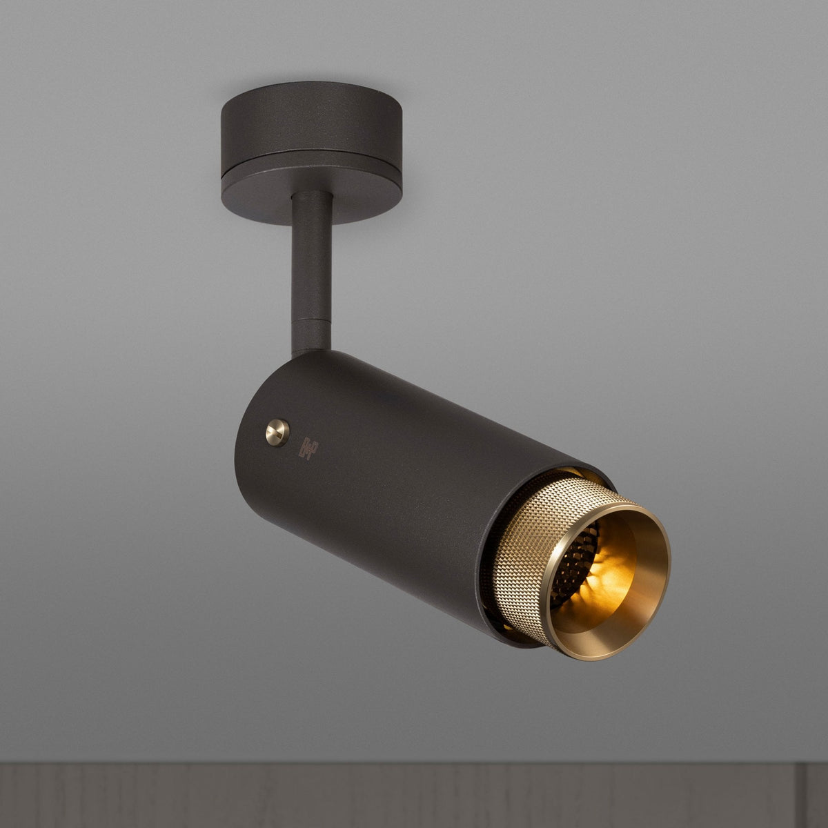 Exhaust Spot Light in a Graphite Finish with Brass Detail