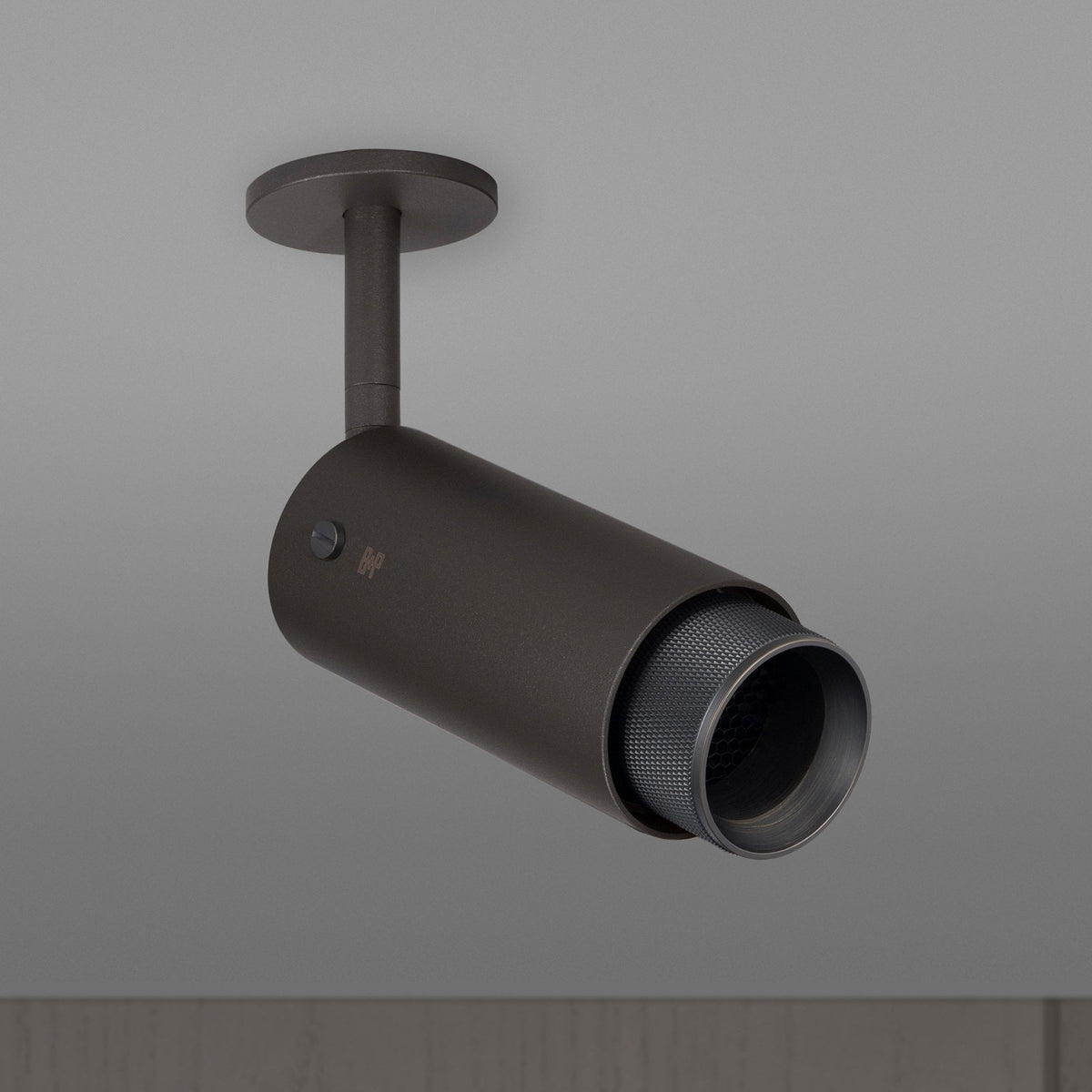 Exhaust Spot Light in a Graphite Finish with Smoked Bronze Detail