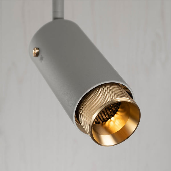 Exhaust Spot Light in a Stone Finish with Brass Detail