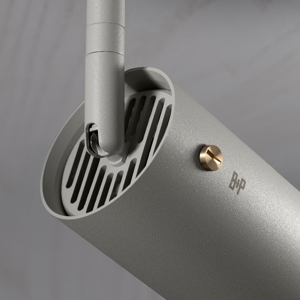 Exhaust Spot Light in a Stone Finish with Brass Detail